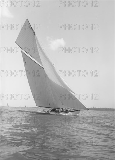 The 15 Metre 'Hispania' sailing close-hauled, 1911. Creator: Kirk & Sons of Cowes.