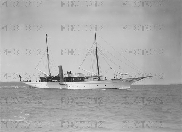 The steam yacht 'Titania' under way, 1911. Creator: Kirk & Sons of Cowes.