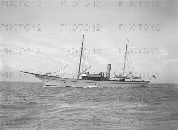 The steam yacht 'Christine' under way, 1911. Creator: Kirk & Sons of Cowes.