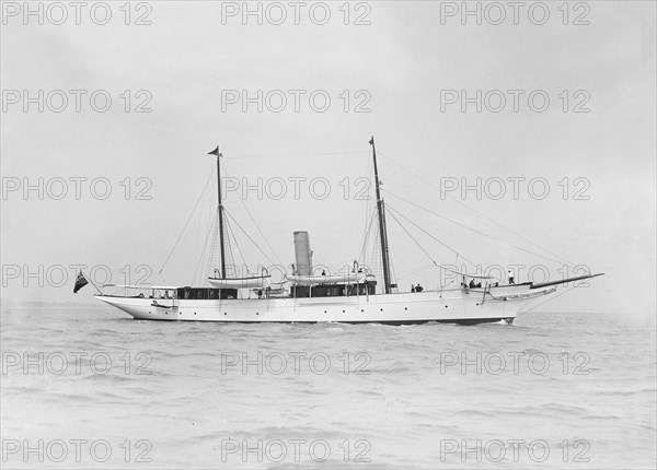 The steam yacht 'Schievan' under way, 1911. Creator: Kirk & Sons of Cowes.