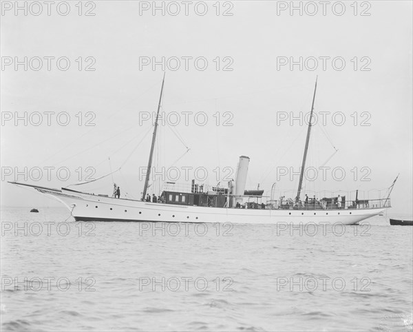 The steam yacht 'Branwyn' at anchor. Creator: Kirk & Sons of Cowes.