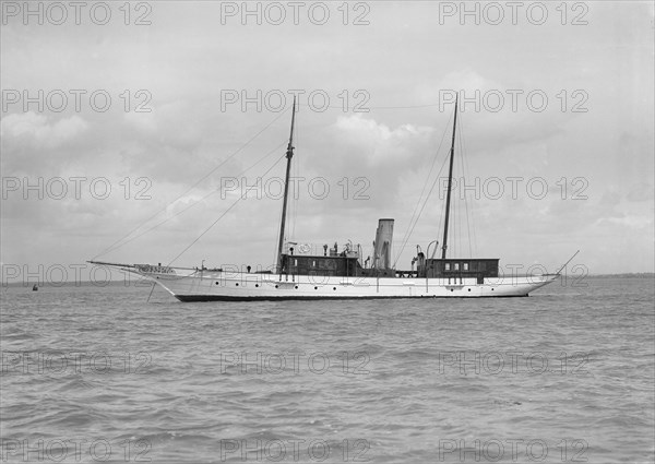 The steam yacht 'Irex' at anchor, 1912. Creator: Kirk & Sons of Cowes.