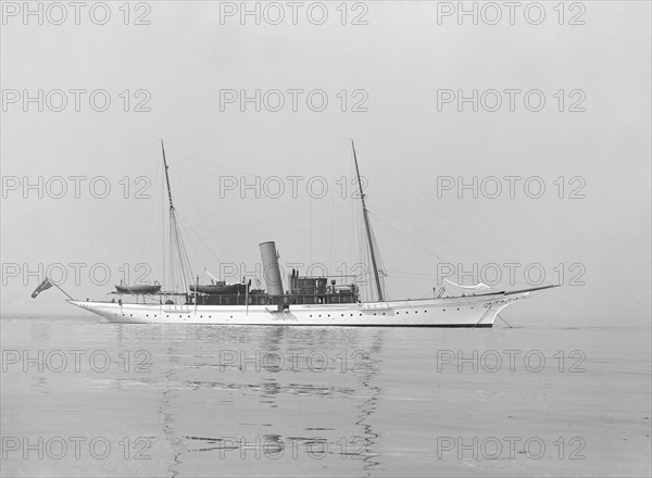 The steam yacht 'Sabrina' at anchor, 1914. Creator: Kirk & Sons of Cowes.