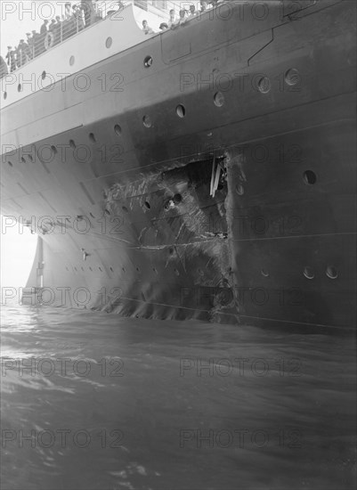 Hole torn in the hull of 'RMS Olympic' after the collision with 'HMS Hawke' in the Solent, 1911. Creator: Kirk & Sons of Cowes.