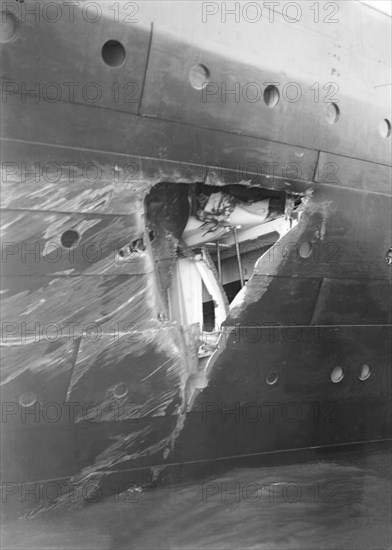 Hole torn in the hull of 'RMS Olympic' after the collision with 'HMS Hawke' in the Solent, 1911. Creator: Kirk & Sons of Cowes.