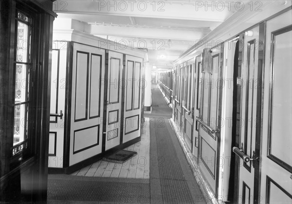 Corridor and cabins on 'SS Insulinde', 1914. Creator: Kirk & Sons of Cowes.
