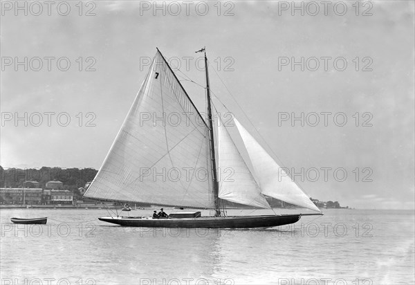 The cutter 'Eve' under sail, 1911. Creator: Kirk & Sons of Cowes.