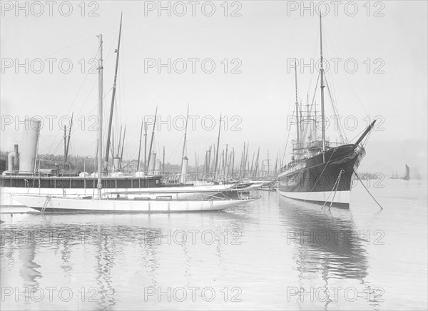 Yachts lying up at Cowes. Creator: Kirk & Sons of Cowes.