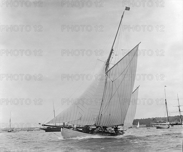 The yawl 'Valentine' under sail, 1909. Creator: Kirk & Sons of Cowes.