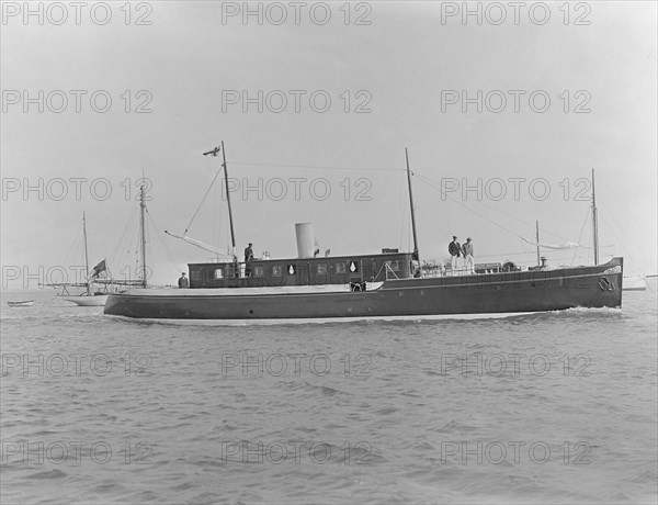 The 65 ton motor yacht 'Mairi' under way, 1921. Creator: Kirk & Sons of Cowes.