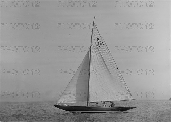 The 6 Metre sailing yacht 'Margaret' (K14) sailing close-hauled, 1921. Creator: Kirk & Sons of Cowes.