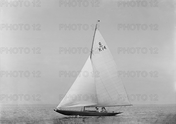 The 6 Metre sailing yacht 'Margaret' (K14) sailing close-hauled, 1921. Creator: Kirk & Sons of Cowes.