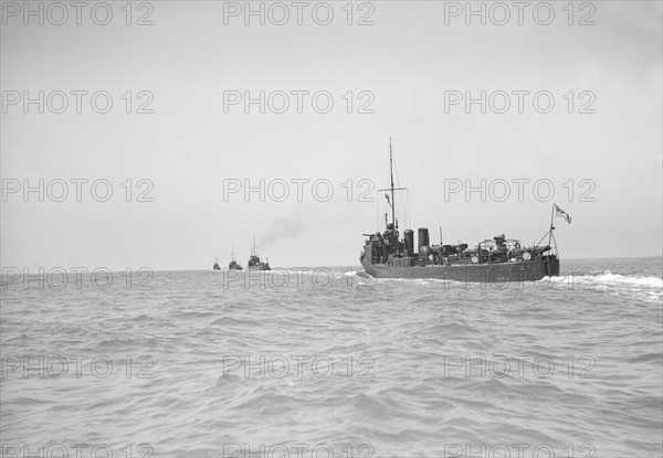 Line of Torpedo Boats under way, 1911. Creator: Kirk & Sons of Cowes.