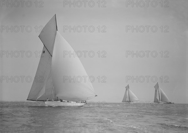 The cutter 'Onda' sailing under spinnaker, 1911. Creator: Kirk & Sons of Cowes.
