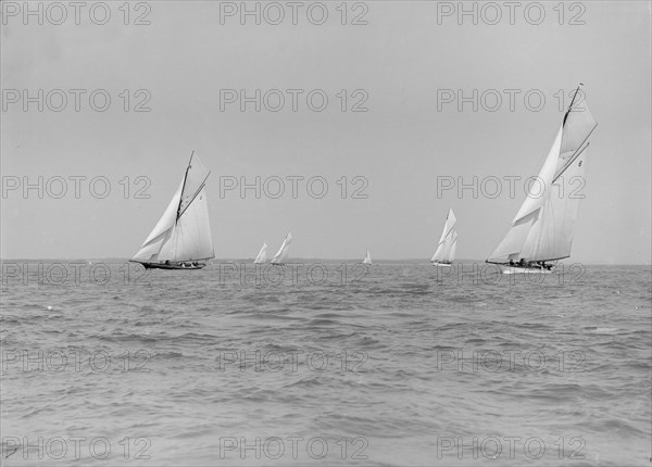 Group of cruisers sailing close-hauled, 1913. Creator: Kirk & Sons of Cowes.