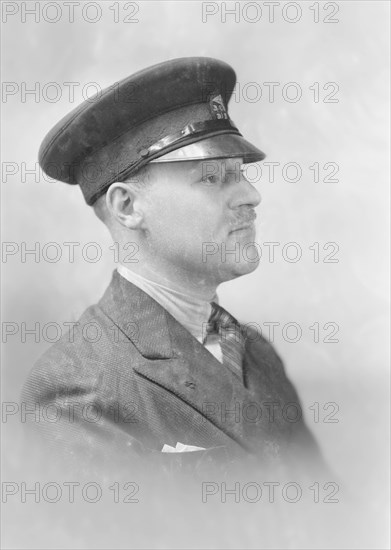 Portrait of a man in uniform, c1935. Creator: Kirk & Sons of Cowes.