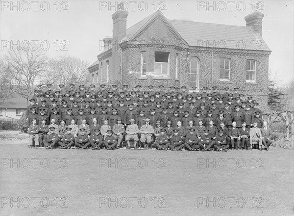 Group portrait of wardens, c1935. Creator: Kirk & Sons of Cowes.