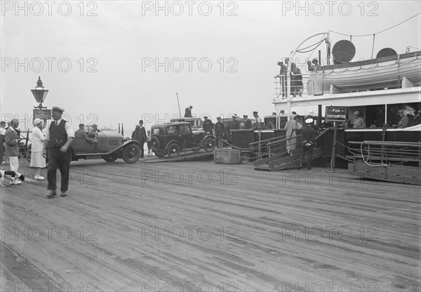 Cars embarking on Southampton ferry. Creator: Kirk & Sons of Cowes.