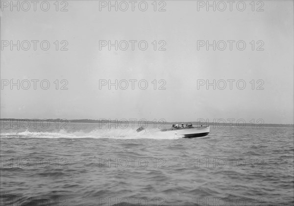 Unknown speedboat underway. Creator: Kirk & Sons of Cowes.