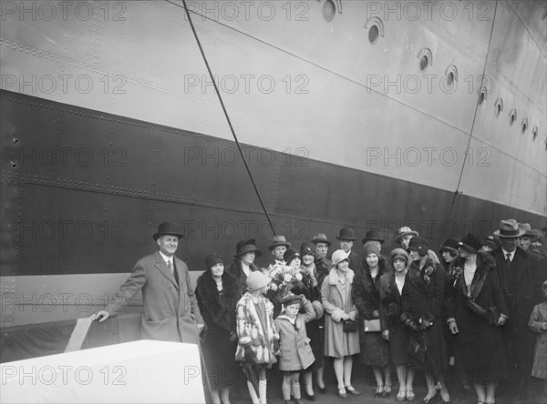 Christening Group possibly at J Samuel White and Co shipyard, Cowes, Isle of Wight, c1930s.  Creator: Kirk & Sons of Cowes.