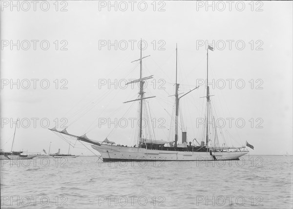 Unknown barquentine at anchor. Creator: Kirk & Sons of Cowes.