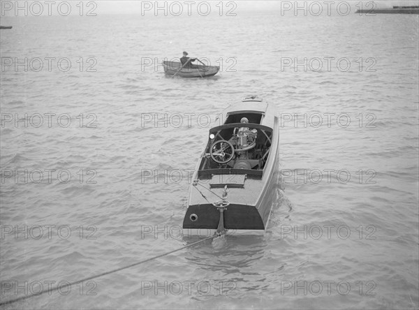 21 Footer motor launch showing engines, 1914. Creator: Kirk & Sons of Cowes.