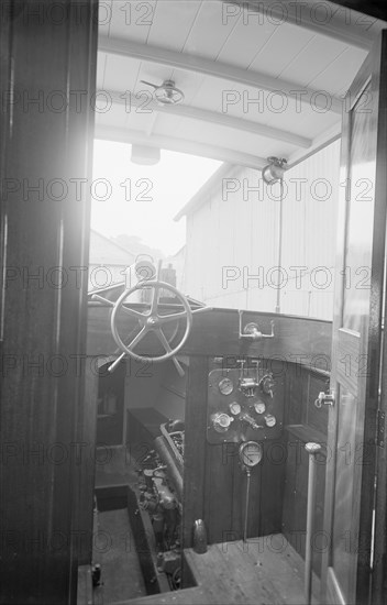 Cockpit and hold on cabin cruiser D.G.S.P., 1913. Creator: Kirk & Sons of Cowes.