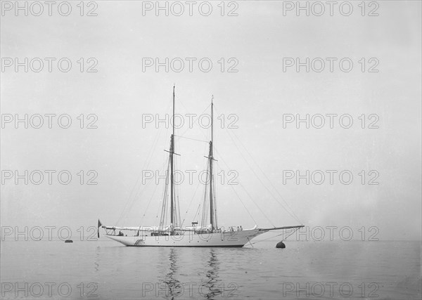 Schooner at anchor. Creator: Kirk & Sons of Cowes.