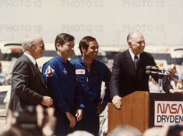 Astronauts John Young and Robert Crippen after landing, April 1981. Creator: NASA.
