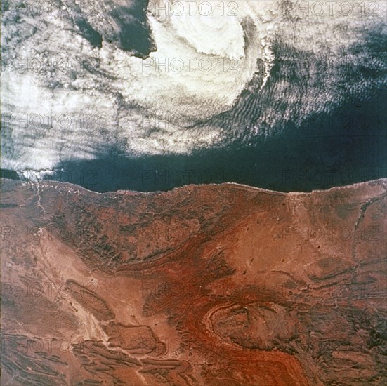 Earth from space - eye of a storm seen from Gemini 5, 1965. Creator: NASA.