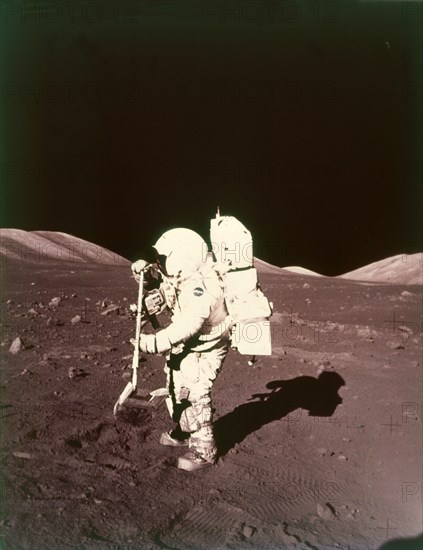 Harrison Schmitt collects lunar rake samples, Apollo 17 mission, December 1972. Creator: NASA.