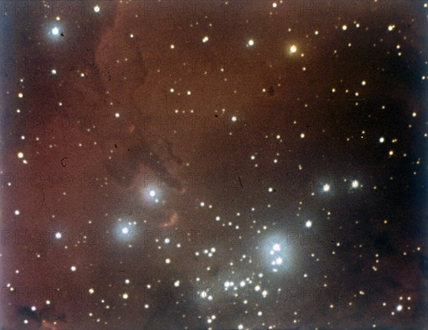 Nebulosity and star cluster in Serpens. Creator: NASA.