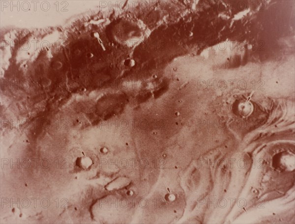 'Fog'-filled craters, Mars. Creator: NASA.