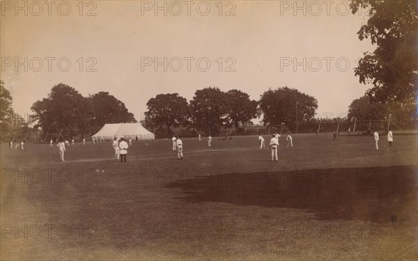 Cricket match, late 19th-early 20th century.