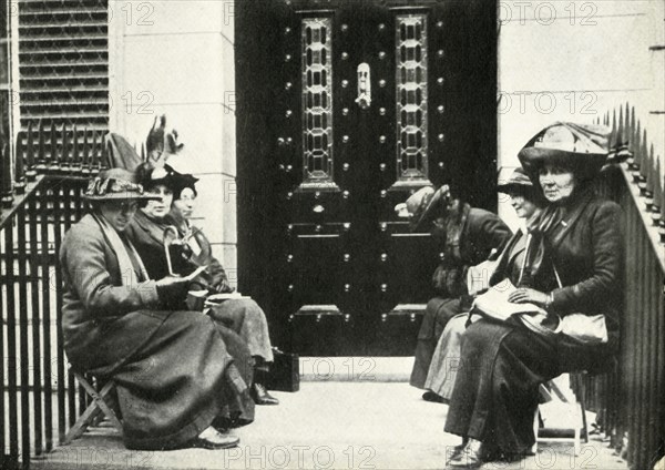 Suffragettes waiting on the doorstep of Sir Edward Carson's London home, 6 April 1914, (1947).