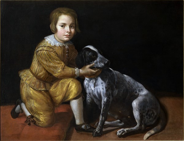 Portrait of a boy with a dog.
