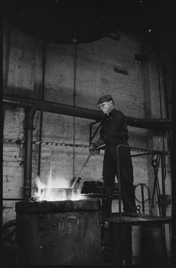 Man working at the Wear Flint Glass Works, Alfred Street, Millfield, Sunderland, 1961