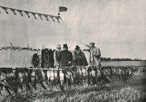 King Edward VII inspecting the bag at Sherborne Estate, 1902, (1910).