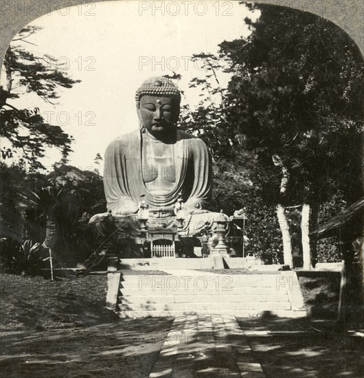 Colossal statue of Buddha, reverenced by the Japanese, in a sylvan Temple, Kamakura, Japan', c1900.