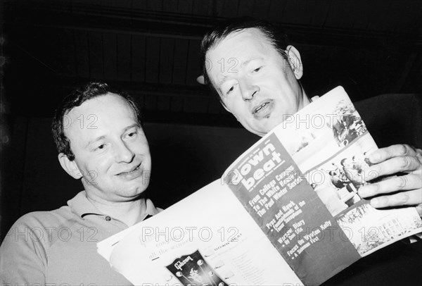 Humphrey Lyttleton and Alex Welsh reading a copy of Down Beat magazine, 1963.