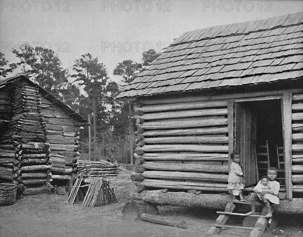 Negro Log Huts, Thomasville, Georgia', c1897.