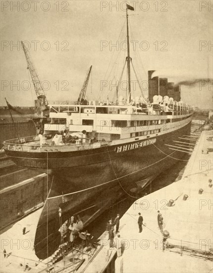 Overhauling a Large Liner in a Graving Dock at Liverpool', c1930.