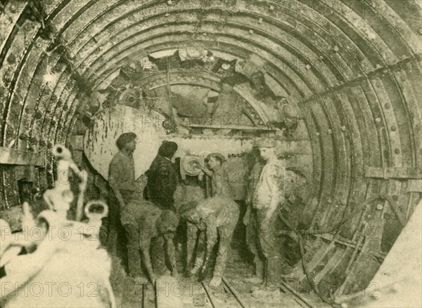 Rotary Cutter at Work in the Enlarged Tube of the City and South London Railway Line', c1930.