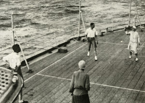 Their Majesties, in a Game of Deck Quoits on Deck of H.M.S. "Renown", 1927', 1937.