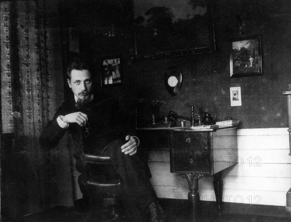 Rainer Maria Rilke in his study, c. 1905.