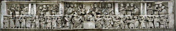 Constantine distributing money to the people (Liberalitas). Detail of the Arch of Constantine, 312-3