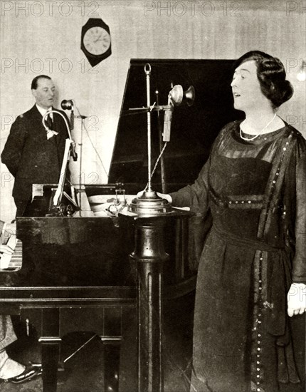 Performers singing a duet in one of the studios of 2LO, Savoy Hill