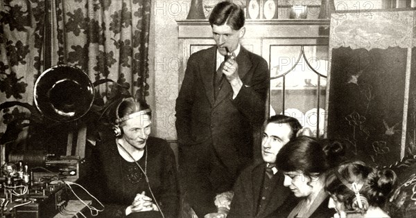 A family listening to the results of the general election of 1923,-1935
