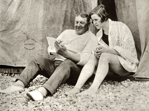 Gertrude Ederle receiving advice from her trainer Jabez Wolff,1926