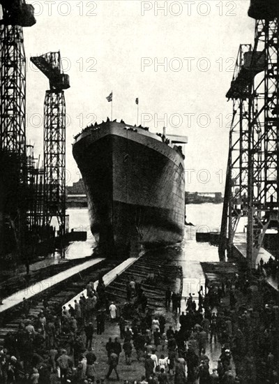 'Built in a Belfast Shipyard - The launching of the Edinburgh Castle, a fine ship built recently for Creator: Unknown